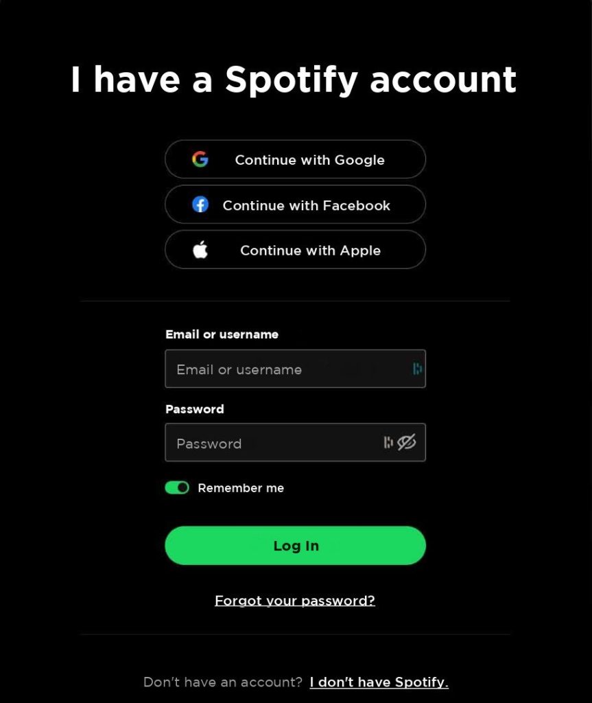 Přihlašovací stránka Spotify s tlačítky Google, Facebook a Apple